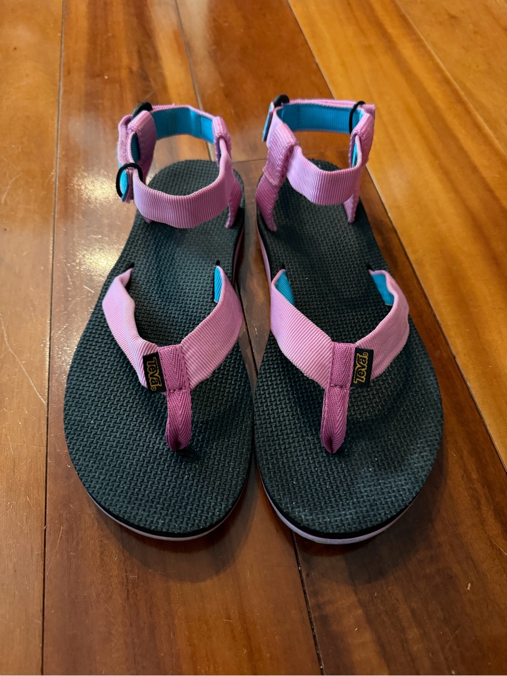 Teva womens Pink Strap Sandals with Black Footbed and Blue Lining.size 10.hiking